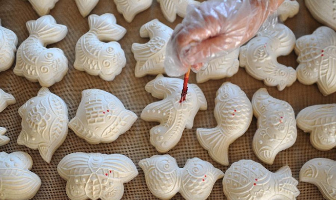 People across China make traditional food to greet Winter Solstice