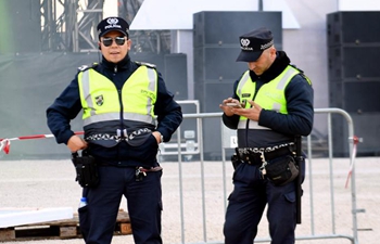 Policemen guard at Comercio square prior to New Year eve concert in Lisbon