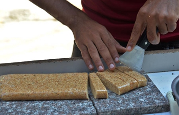 Vendors sell sweets in Gaza City