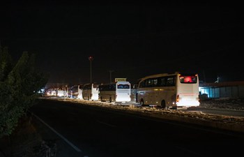 Members of Syrian National Army head for Akcakale in southern Turkey