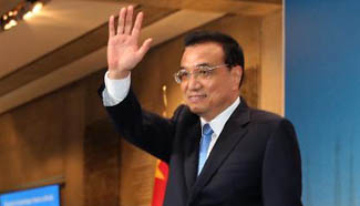 Premier Li Keqiang attends Summer Davos Forum in Dalian