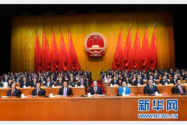 10月1日，慶祝中華人民共和國成立66周年暨新疆維吾爾自治區(qū)成立60周年大會在新疆人民會堂隆重舉行。 新華社記者 饒愛民 攝
