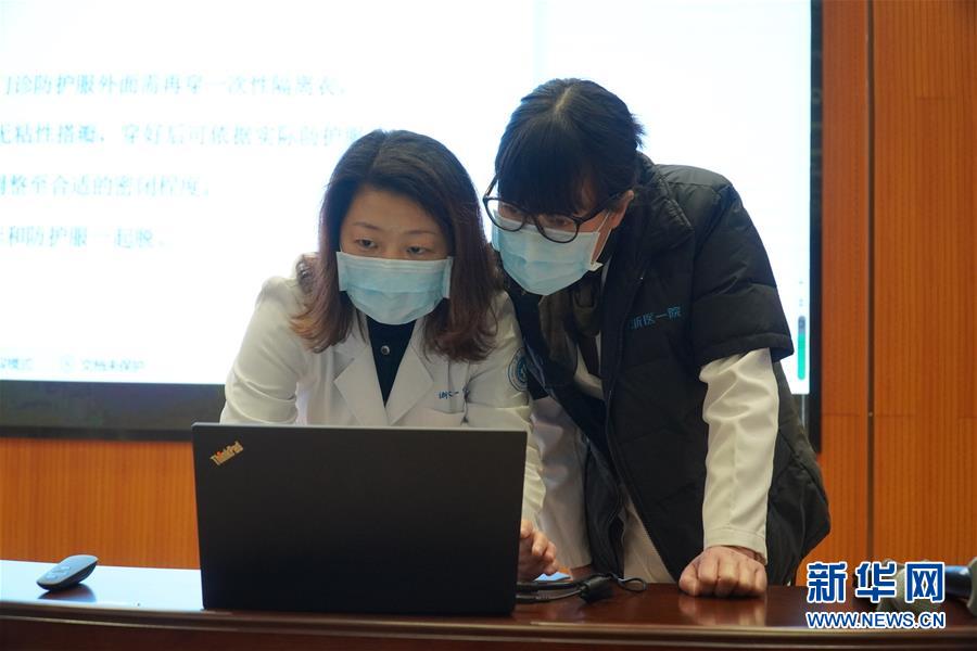 （聚焦疫情防控·圖文互動）（5）無法握手，但始終并肩