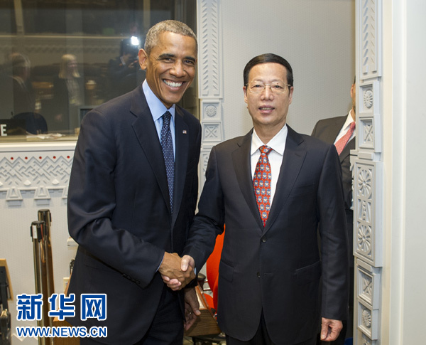 9月23日，國家主席習(xí)近平特使、國務(wù)院副總理張高麗在紐約會見出席聯(lián)合國氣候峰會的美國總統(tǒng)奧巴馬。 新華社記者王曄攝