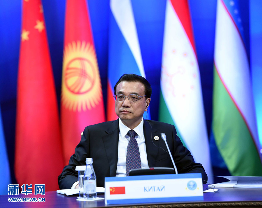 12月15日，中國國務(wù)院總理李克強(qiáng)在阿斯塔納出席上海合作組織成員國政府首腦理事會第十三次會議。 新華社記者 饒愛民 攝